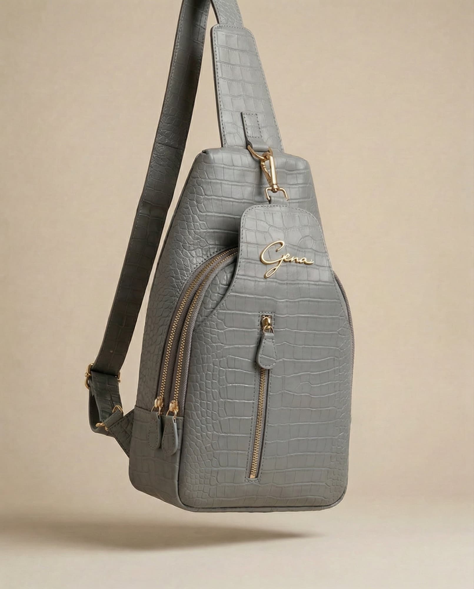 Gray sling bag, studio